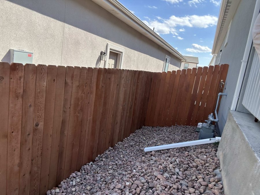 stained wooden fence surrounding yard Preview Image 1