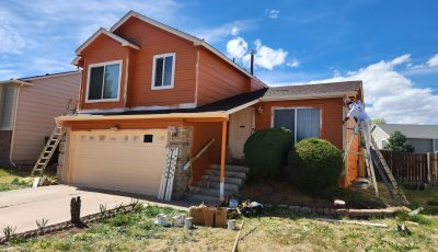 painters working on orange house udate