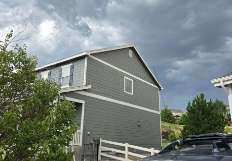 home with grey painted siding