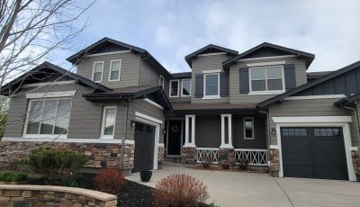 home exterior after siding and trim repaint