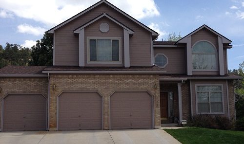 Exterior painting by CertaPro house painters in St. Andrews Country Club, CO