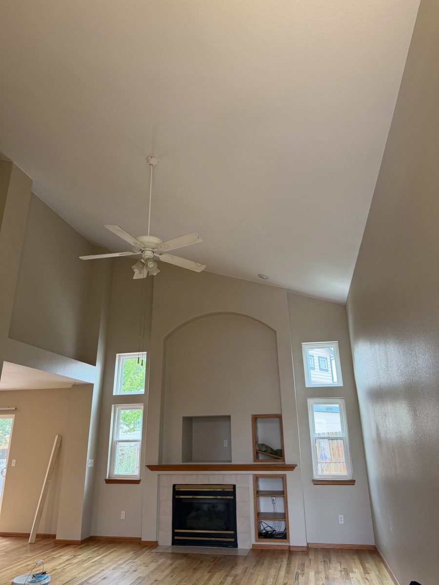 painted home interior room with stained wood trim elements