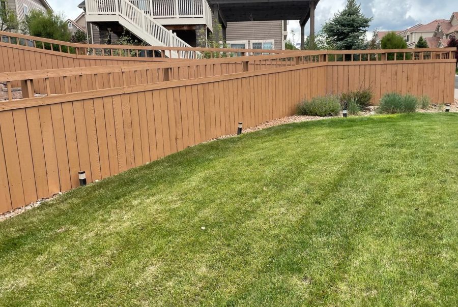 painted fence surrounding house and yard Preview Image 3