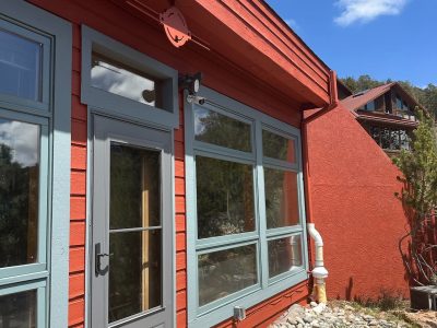 stained home exterior