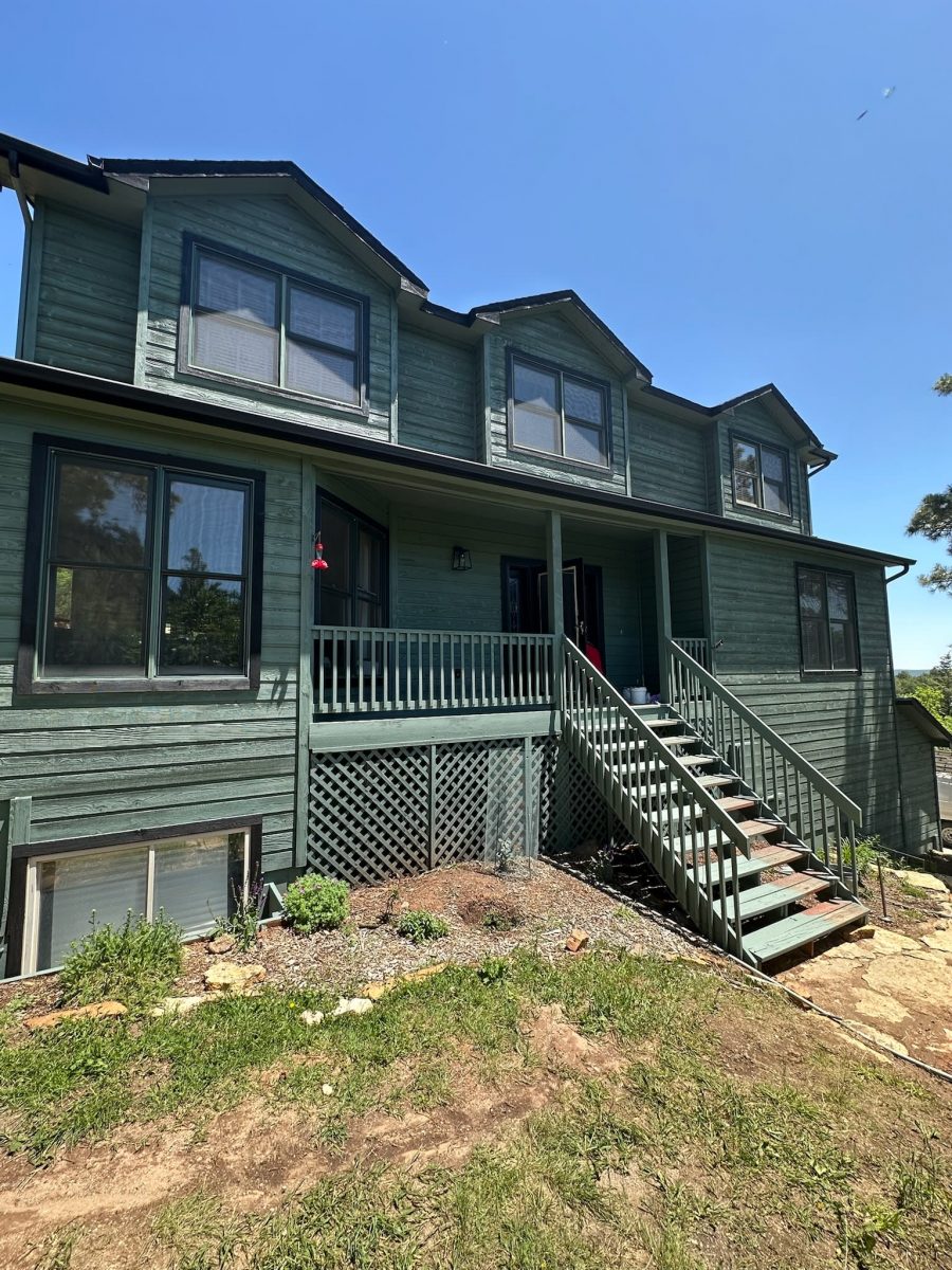 dark green stained home