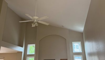 painted home interior room with stained wood trim elements