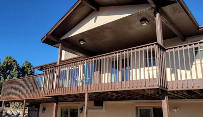 exterior of house with stained deck