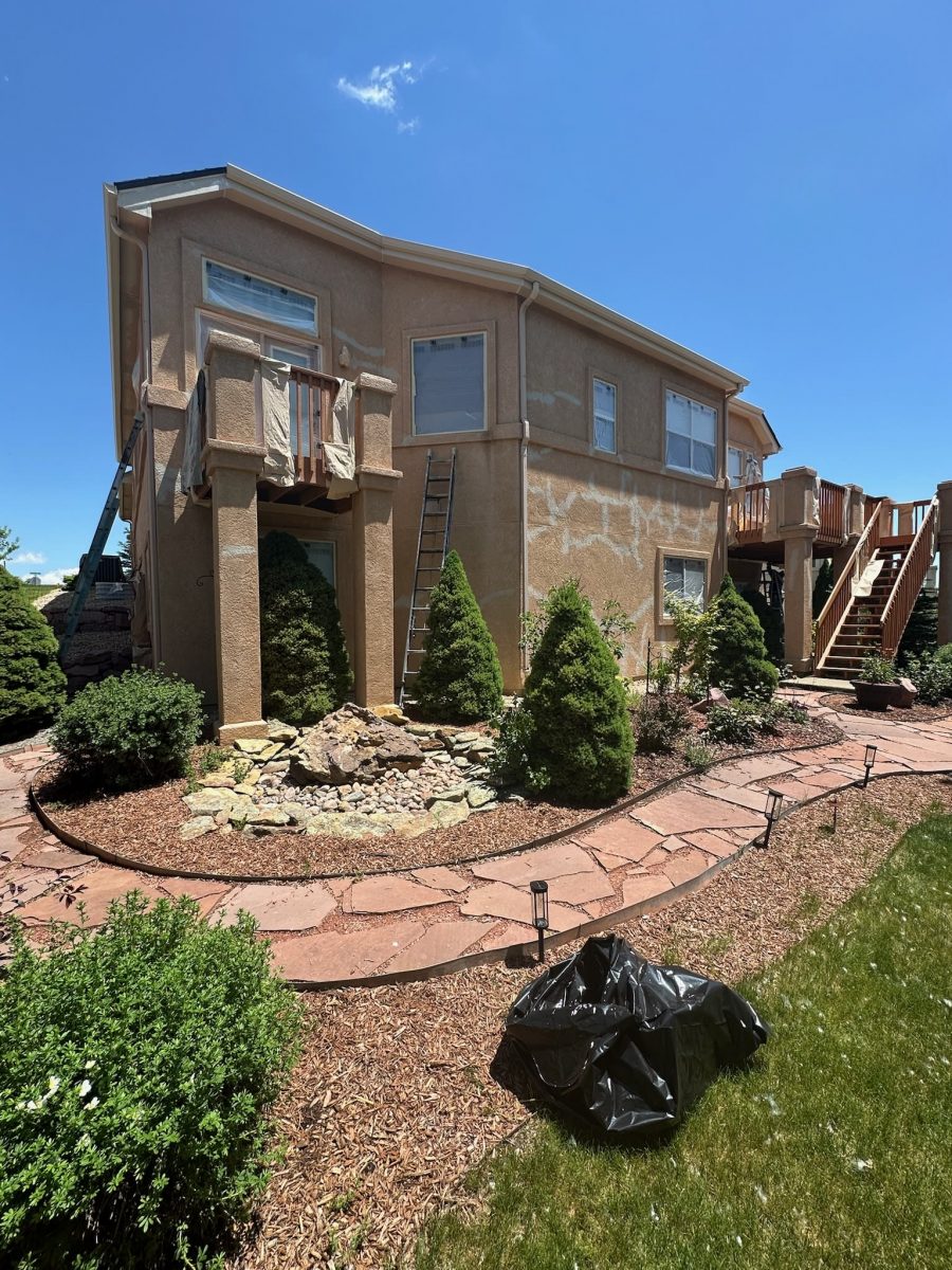 rear side of stucco house with patched cracks Preview Image 5