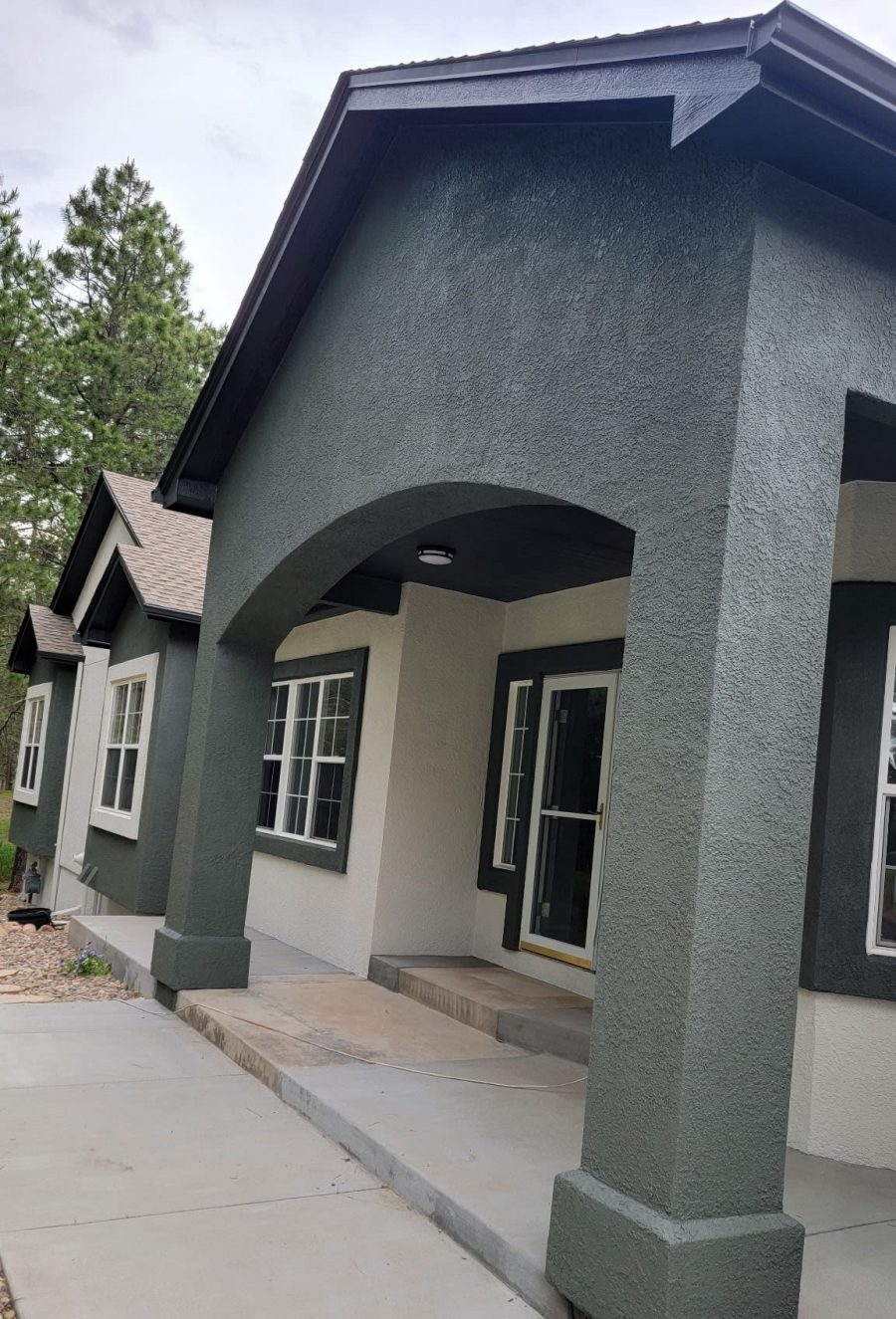 two tone painted stucco covered front porch Preview Image 4