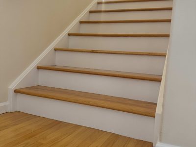 home interior staircase wtih white painted risers and trim