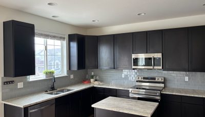 dark painted kitchen cabinets