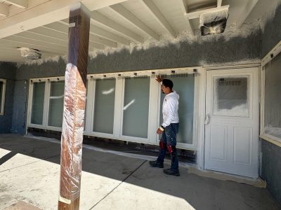 paint prep on exterior of stucco home