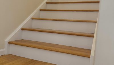 home interior staircase wtih white painted risers and trim