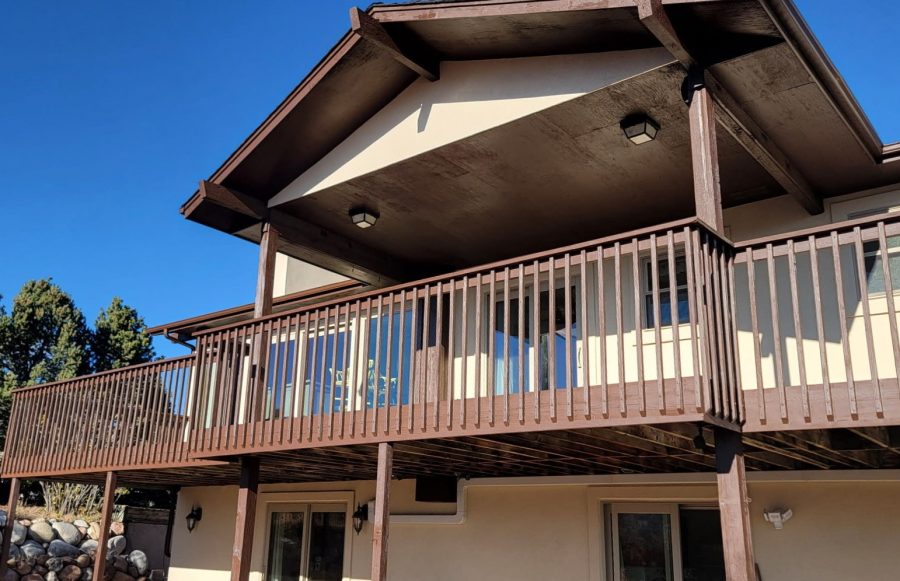 exterior of house with stained deck