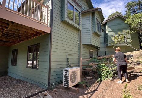 house with green painted siding