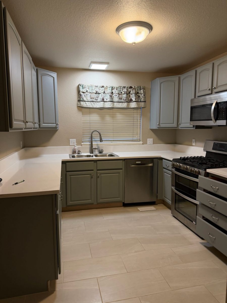 kitchen with painted blue cabinets Preview Image 3