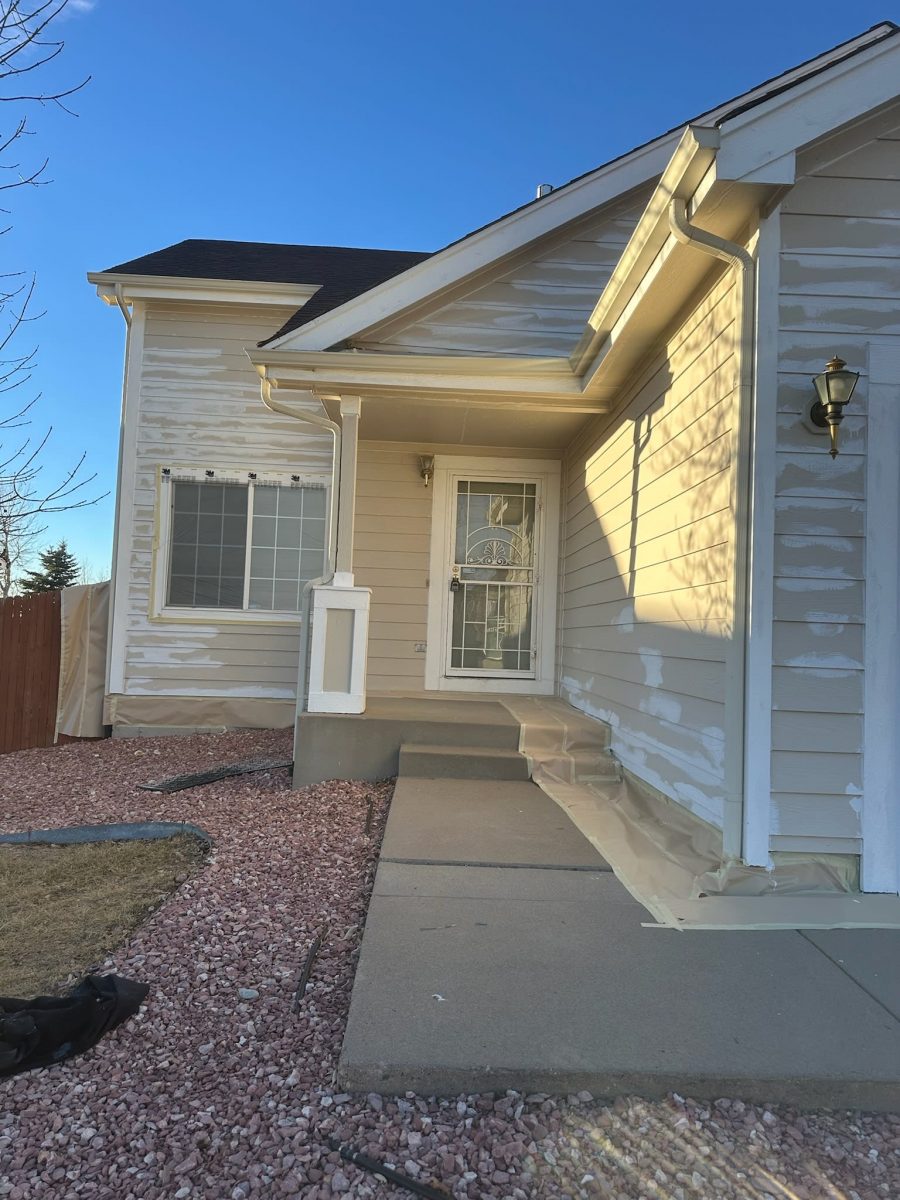 house exterior primed for repaint