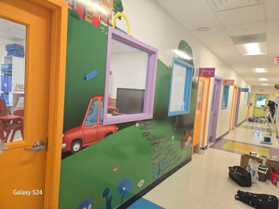 childcare center hallway with colorful doors