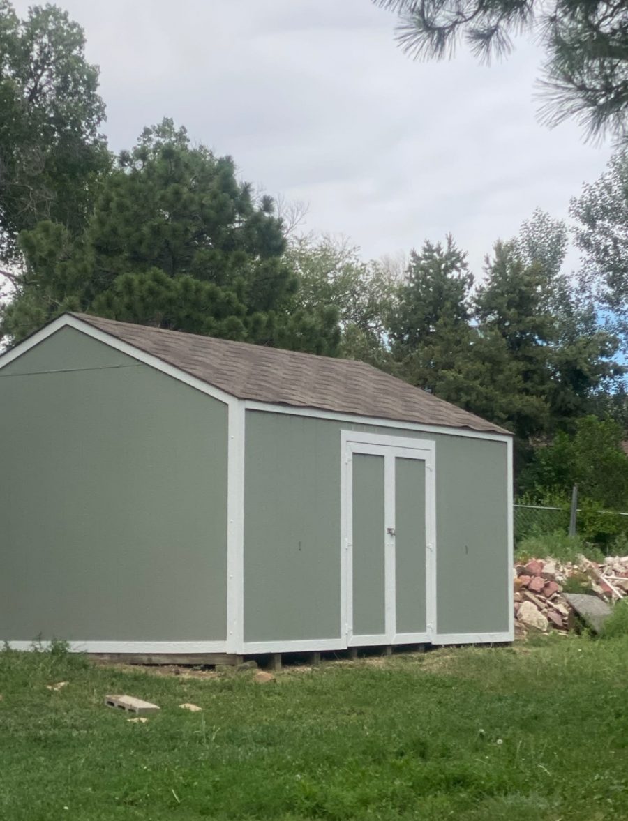 green shed with white trim Preview Image 4