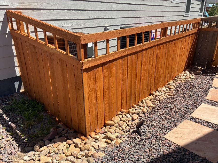 stained fence surrounding house Preview Image 2