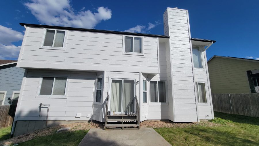back of house with white trim and black painted soffits Preview Image 3