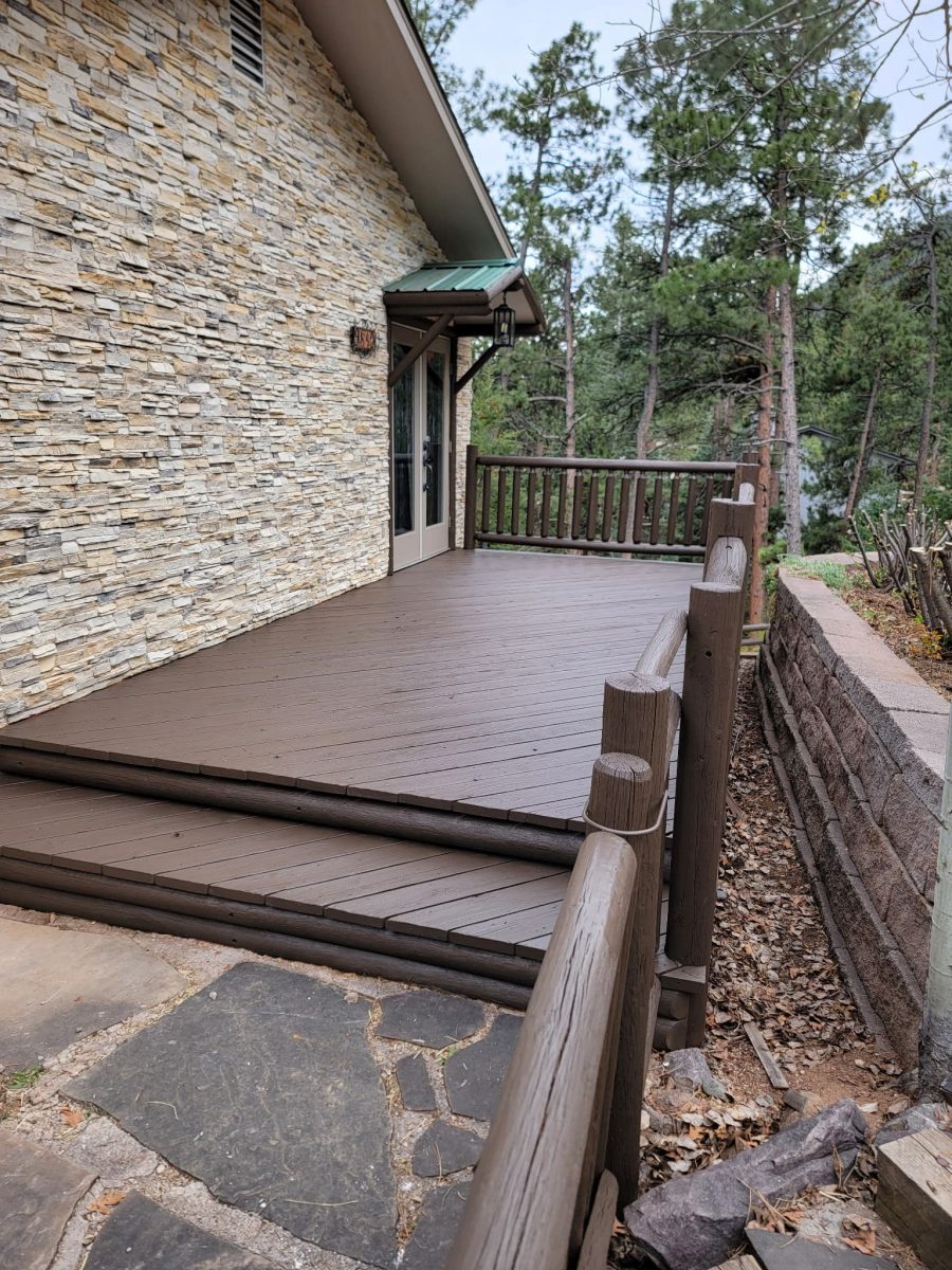 dark brown painted wooden deck attached to home Preview Image 2