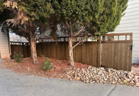 wooden fence with dark stain