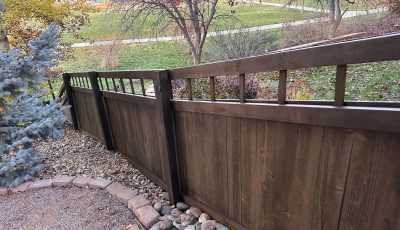 wooden fence with dark stain