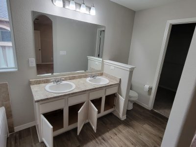 bathroom with double sink vanity