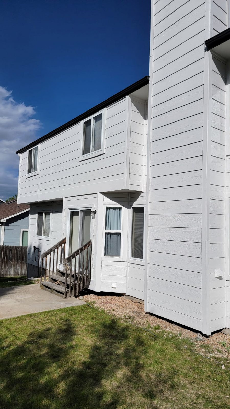 back of house with white trim and black painted soffits Preview Image 4