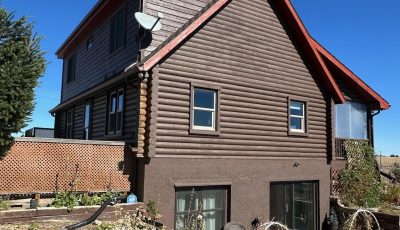 stained log style home exerior