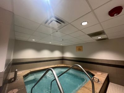 hot tub room with repainted drywall