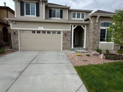 driveway and garage door on front side of house