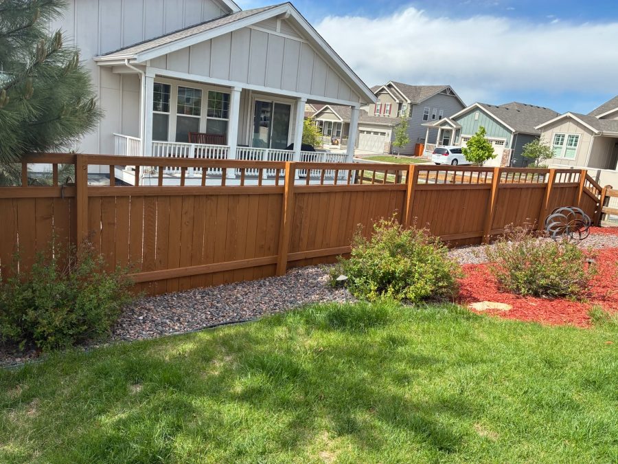stained wooden privacy fence surrounding residential property Preview Image 1