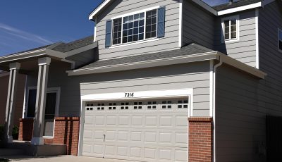 Silver Siding and Brick Exterior