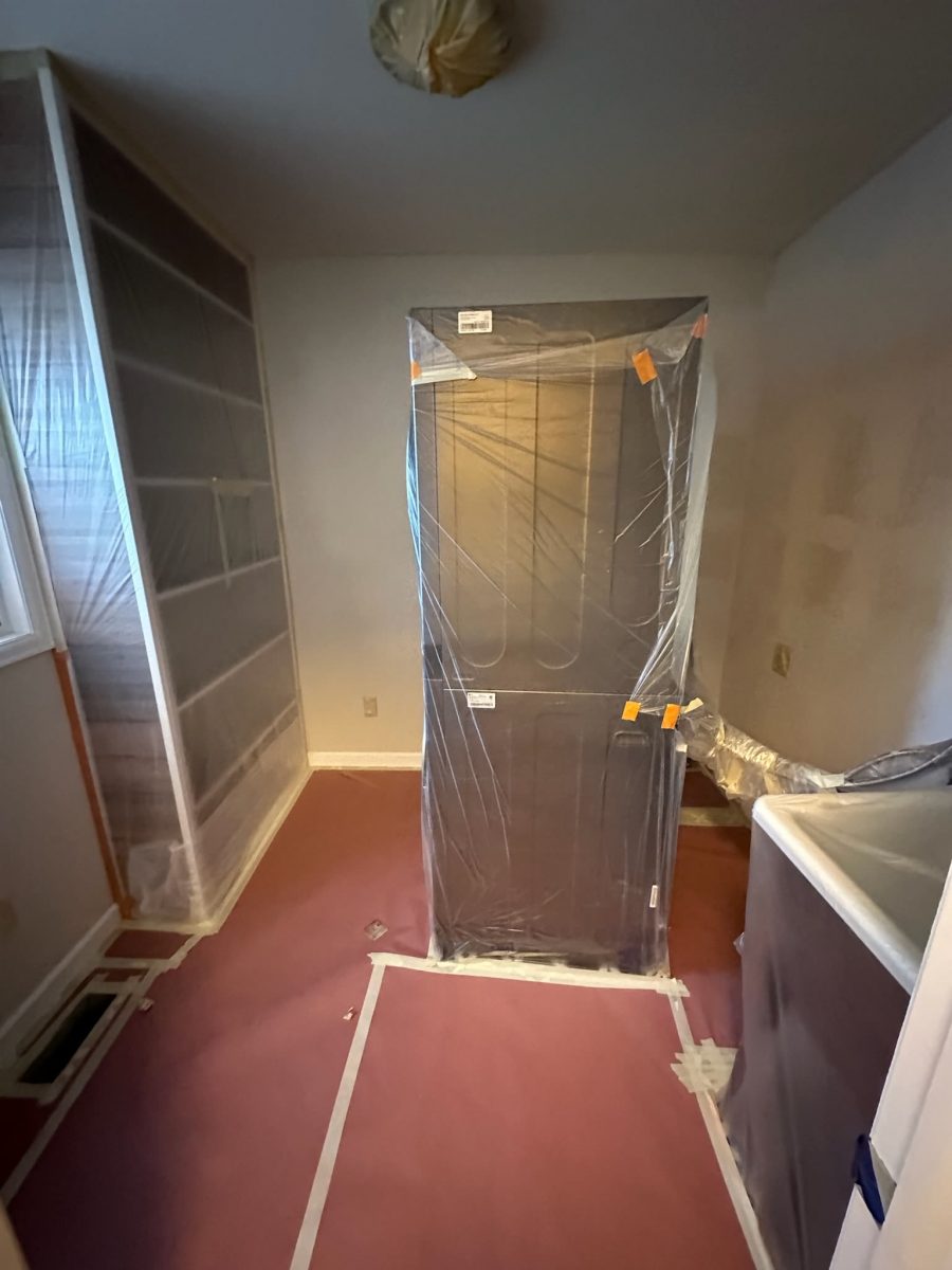 home interior with protective coverings for a paint project Preview Image 1