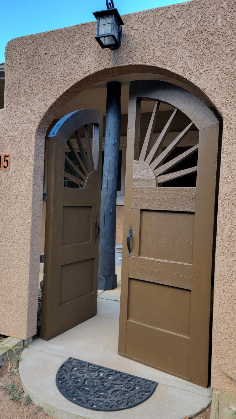 blue painted support beams outside home Preview Image 3