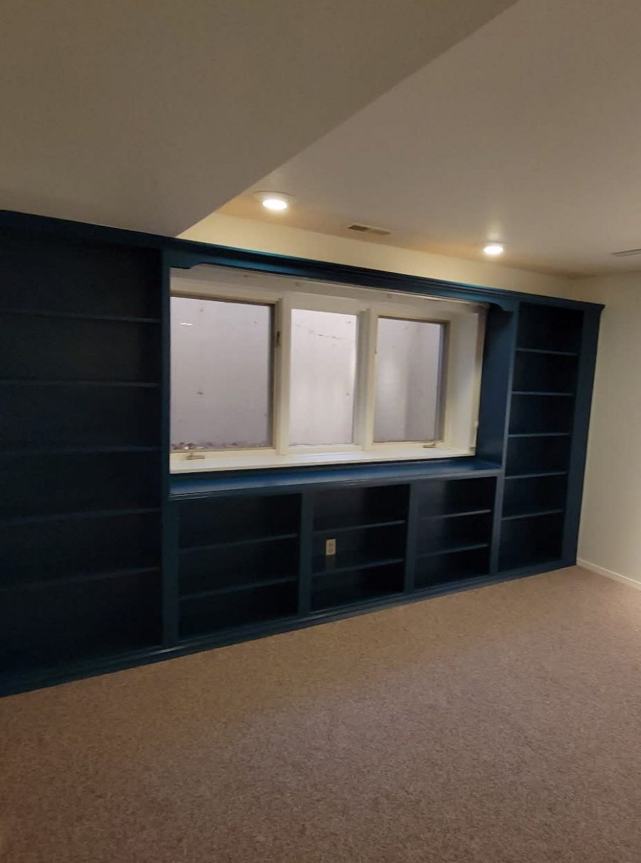 blue painted built-in shelves