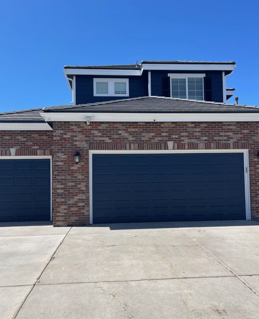 house with blue siding and garage door Preview Image 1
