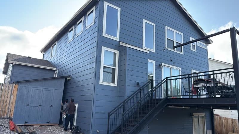 rear of blue painted house Preview Image 2