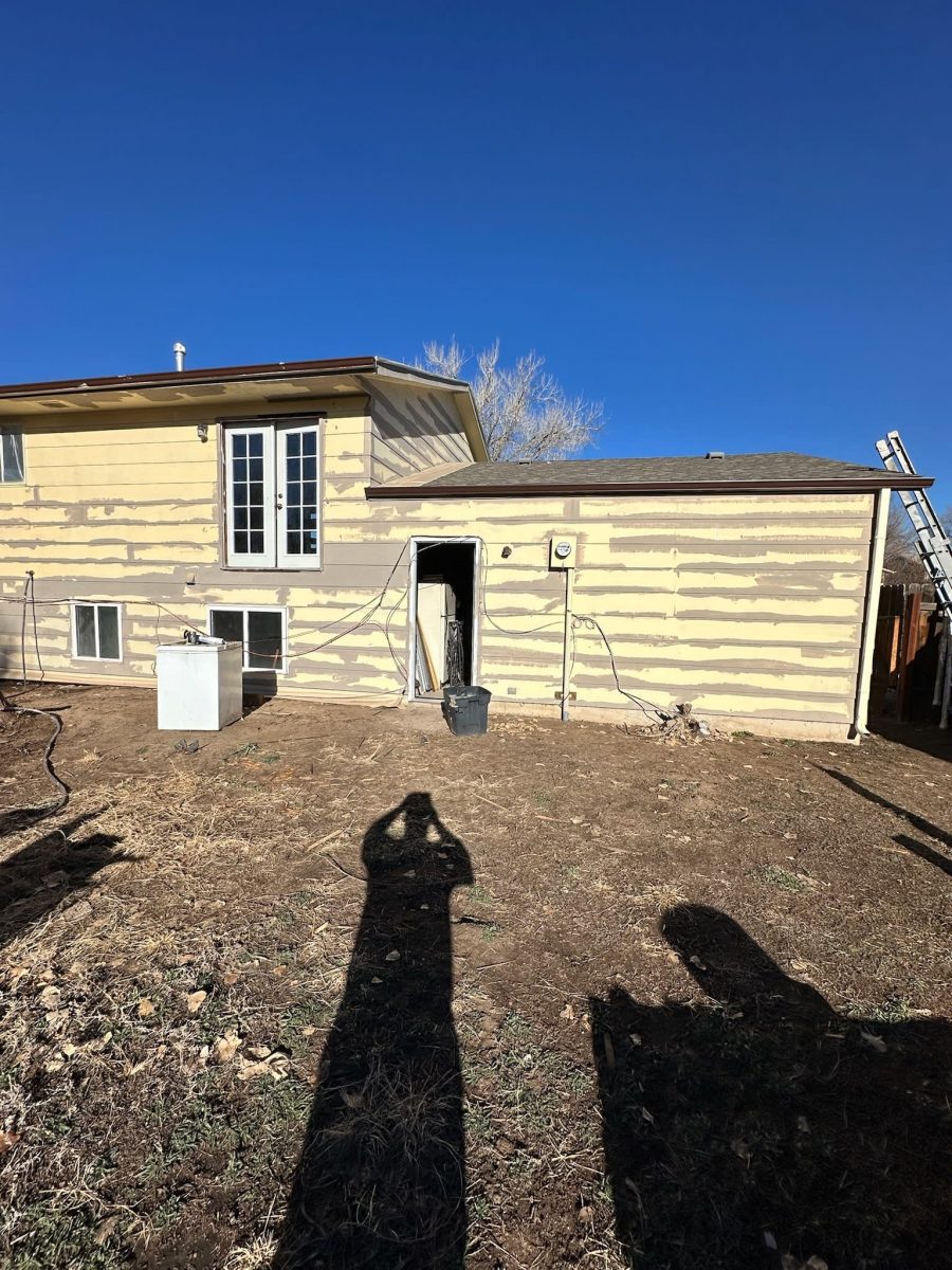 house with yellow siding during repaint Preview Image 6