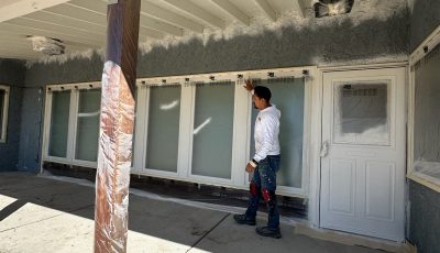 paint prep on exterior of stucco home