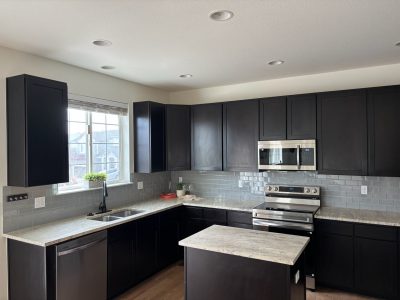 dark painted kitchen cabinets