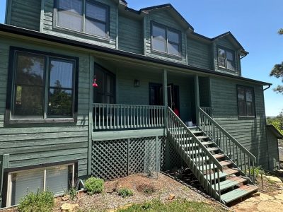 dark green stained home