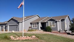 Exterior painting by CertaPro house painters in Peyton, CO
