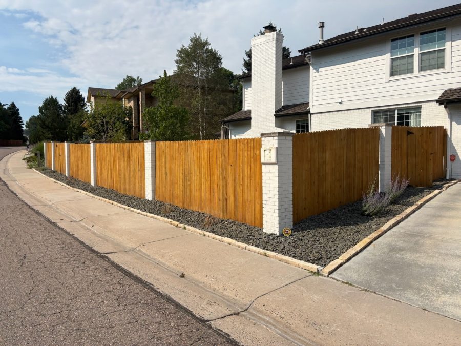 stained wooden fence surrounding home Preview Image 2