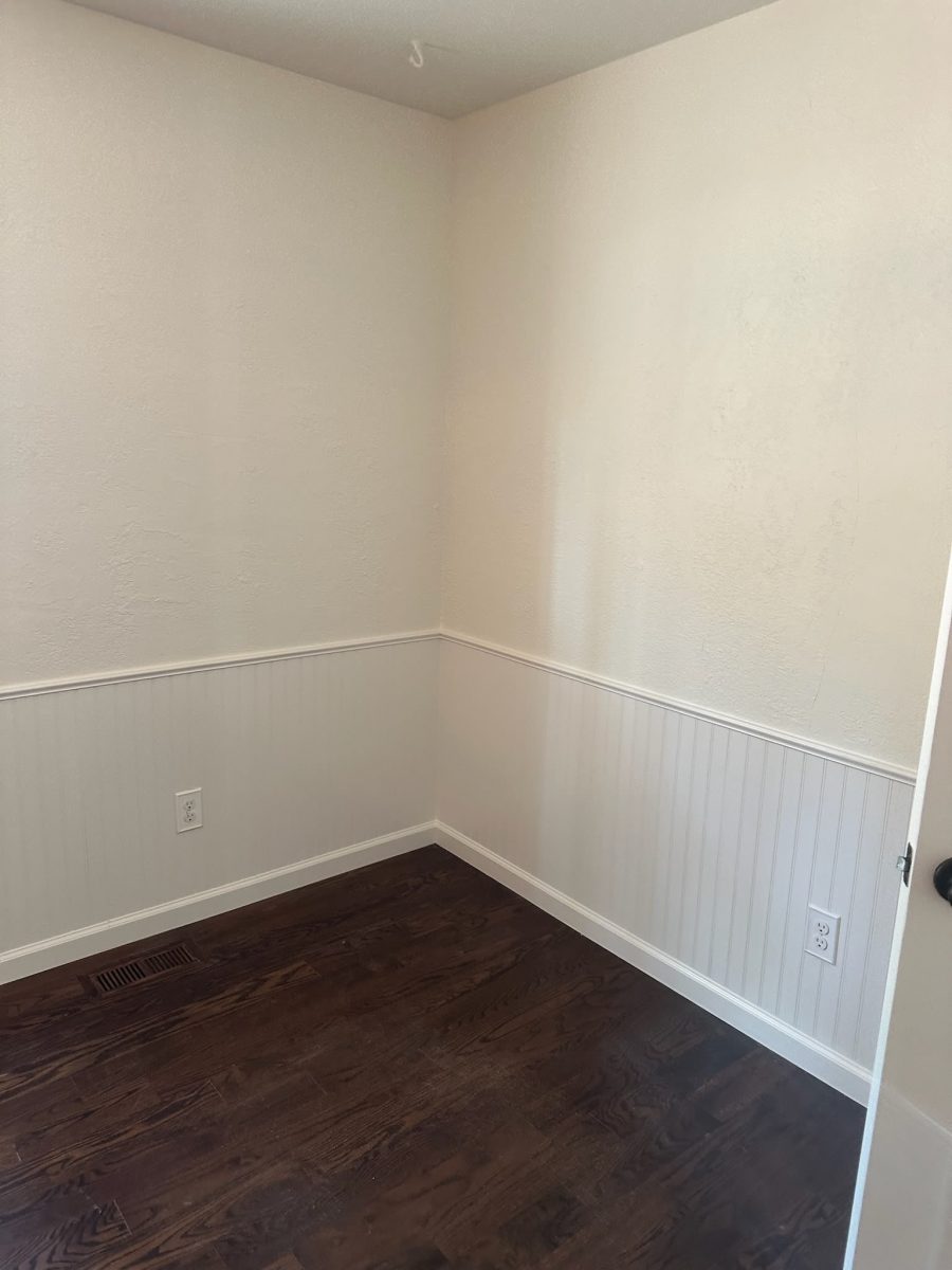 wall corner in empty room of house with chair rail and wood floors Preview Image 4