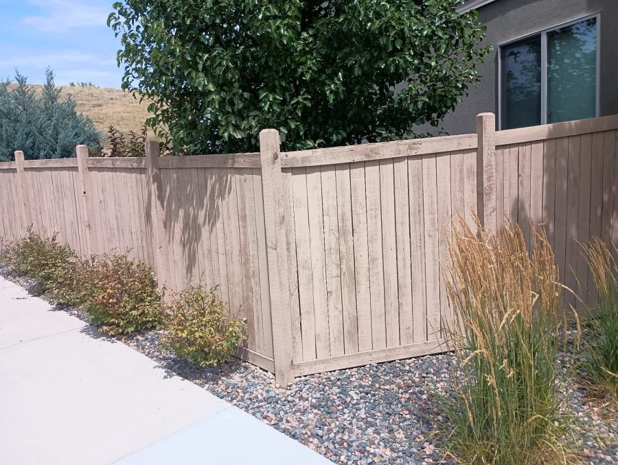 stained fence in neutral color surrounding property Preview Image 2