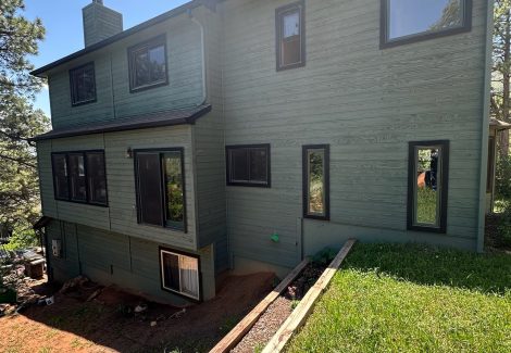 dark green stained home