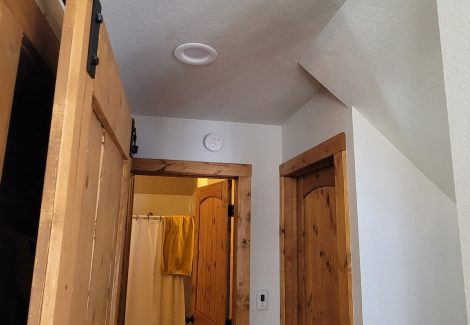 white painted house interior with wooden doors